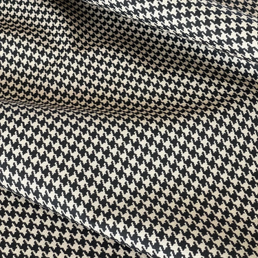 Bold houndstooth pattern on organic cotton fabric – perfect for upholstery, curtains, and home accessories.